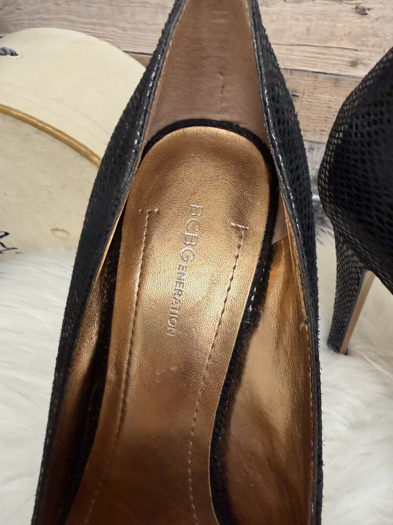 BCBGeneration Black Snakeskin Platform Pumps