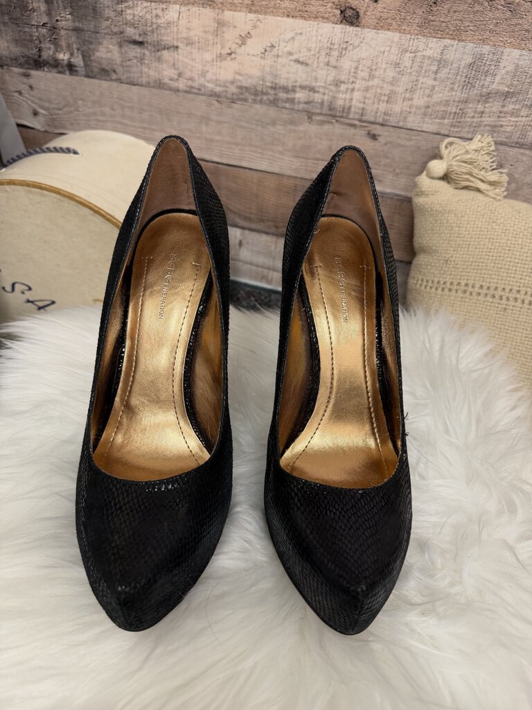 BCBGeneration Black Snakeskin Platform Pumps