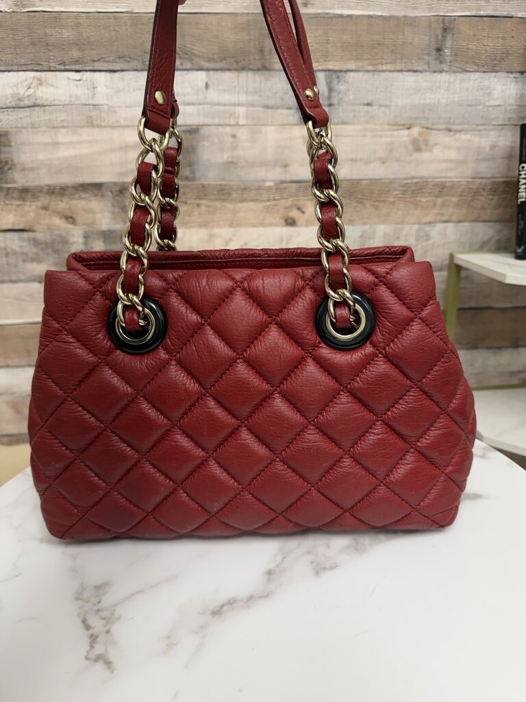 Kate Spade red quilted leather shoulder bag