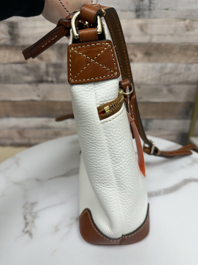 Dooney&Bourke white with with red lining crossbody bag