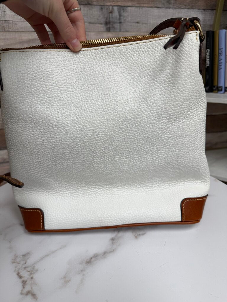 Dooney&Bourke white with with red lining crossbody bag