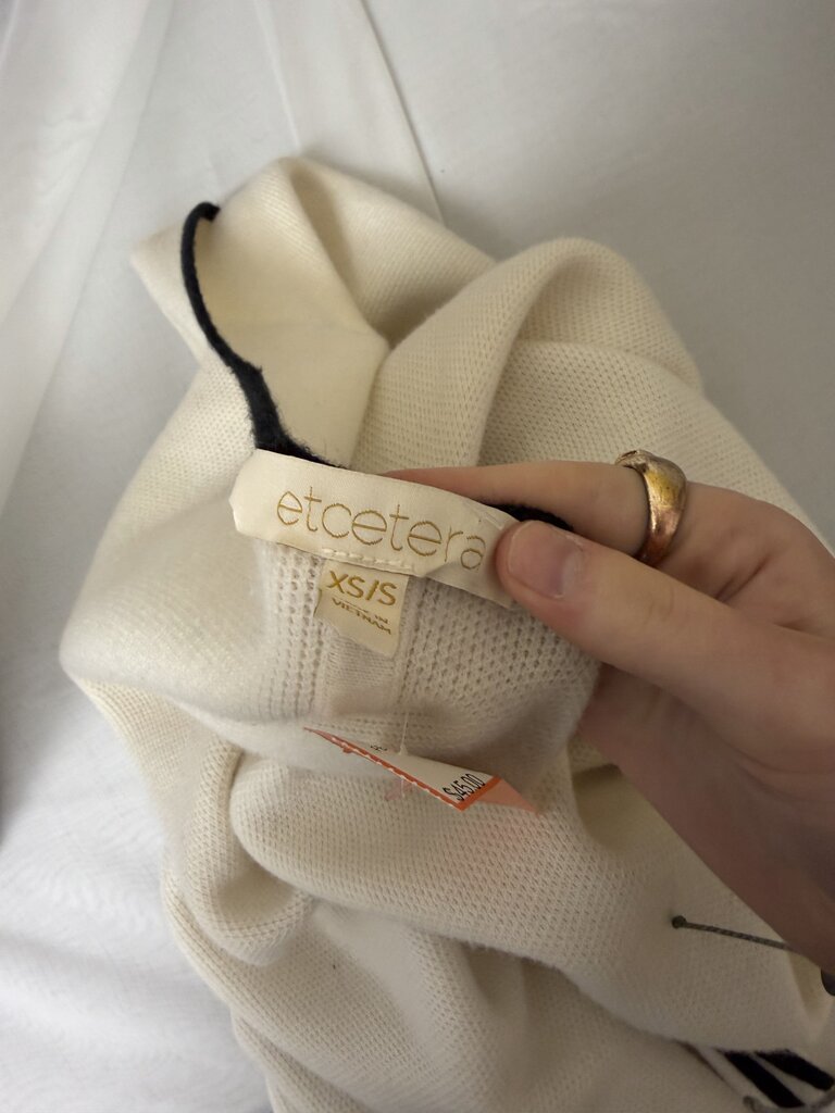 Etcetera Cream With Black Trim Wrap Poncho