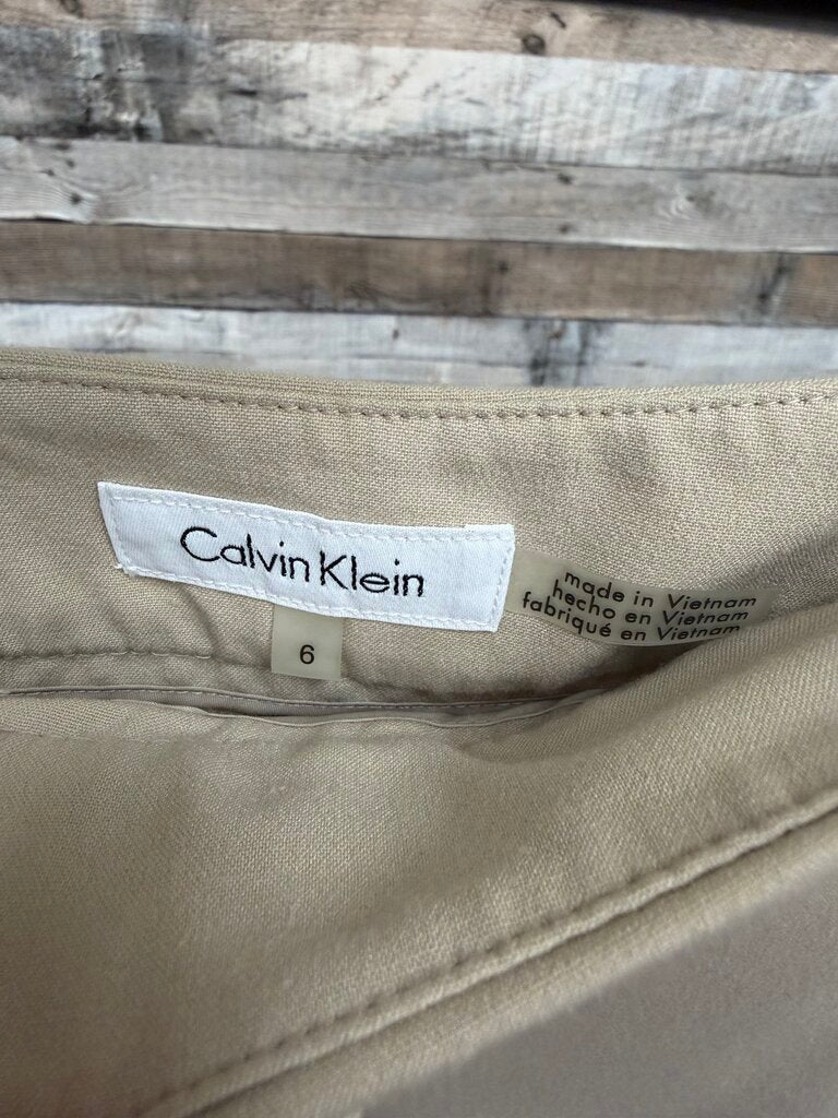 Calvin Klein beige straight leg dress pant with zip pockets