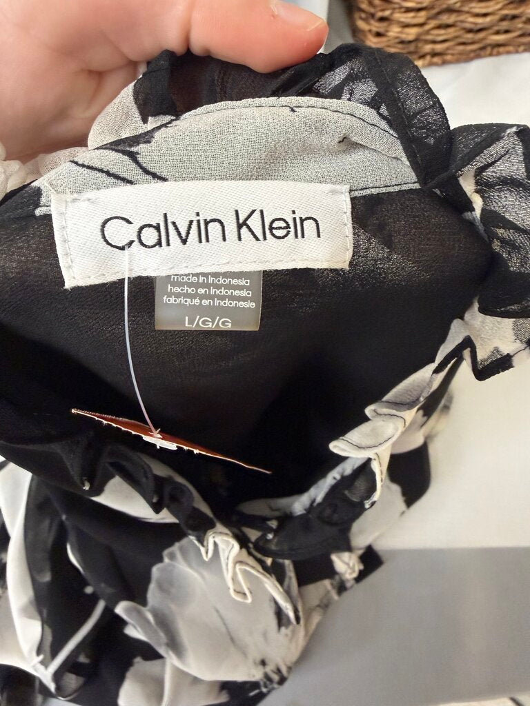 Calvin Klein black with floral print long sleeve with ruffle detail