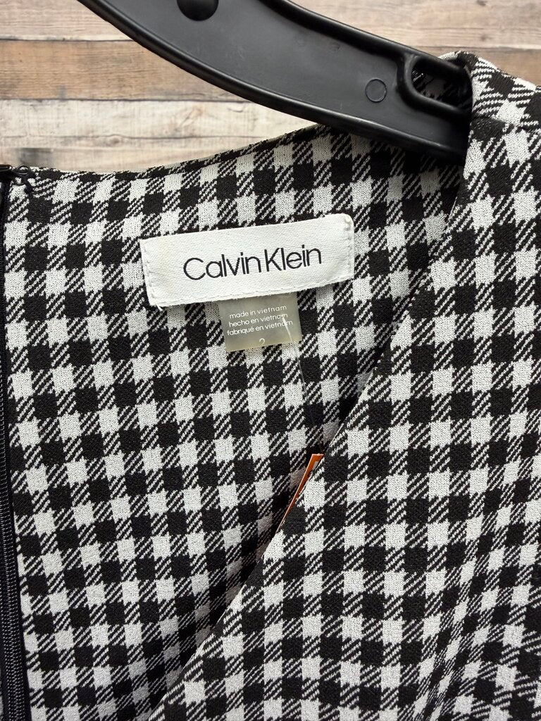 Calvin Klein black white gingham sleeveless belted wide leg jumpsuit