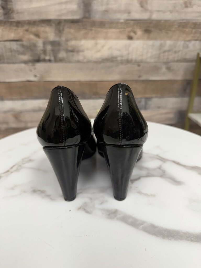 Kate Spade black leather wedge pump