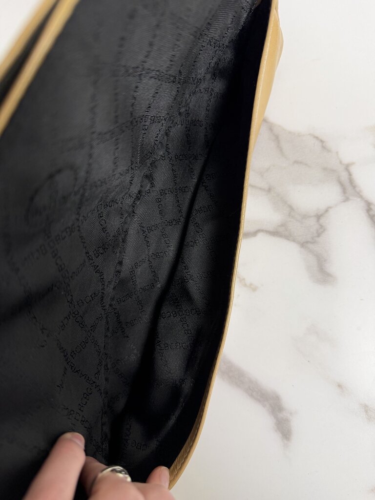 BCBG patent leather clutch