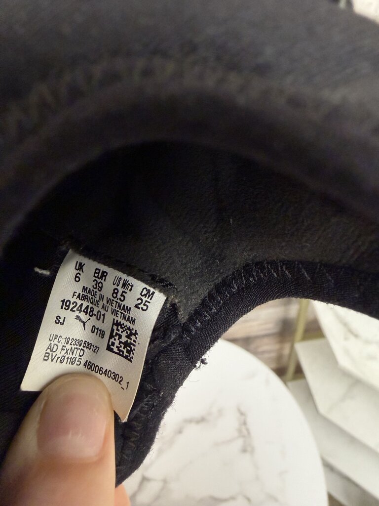 Puma black slip on sneakers