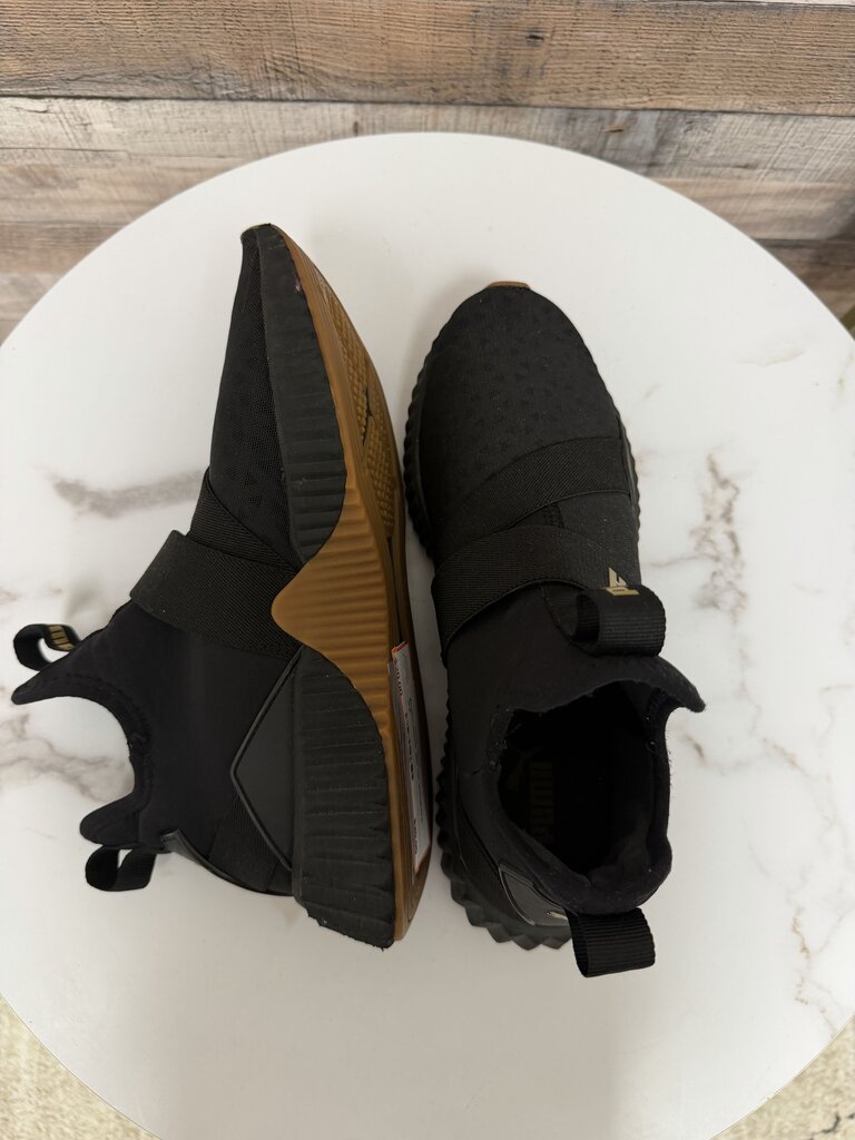 Puma black slip on sneakers