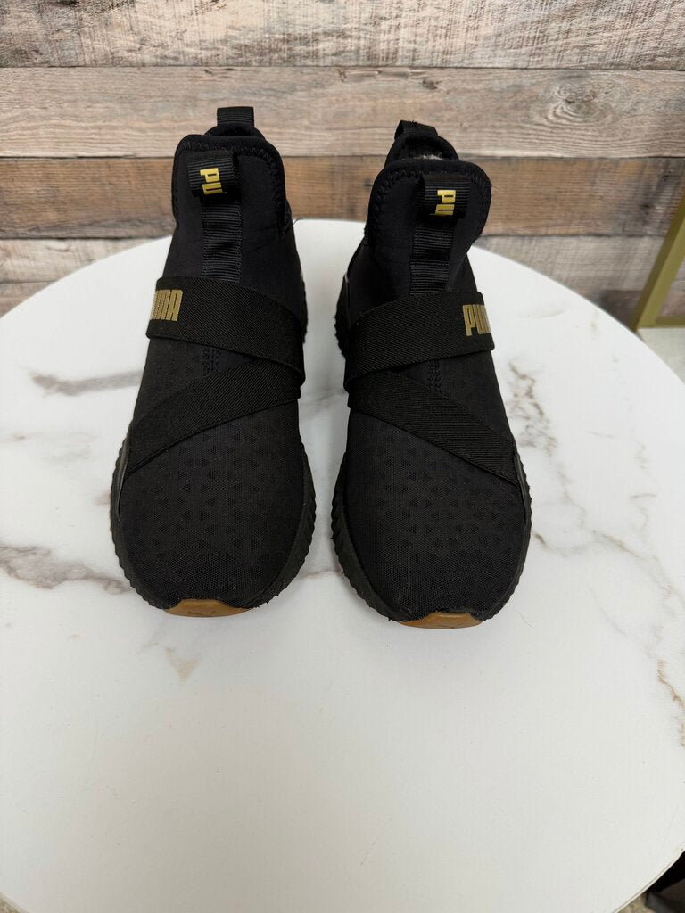 Puma black slip on sneakers