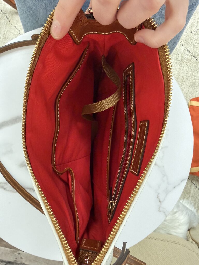 Dooney&Bourke white with with red lining crossbody bag