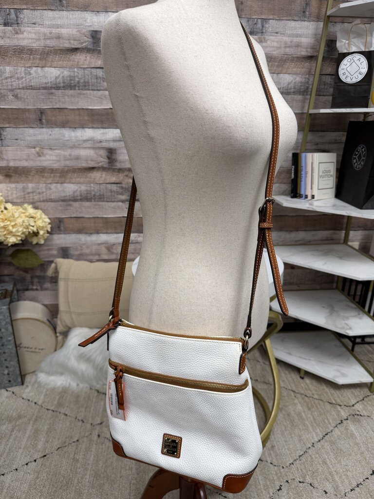 Dooney&Bourke white with with red lining crossbody bag