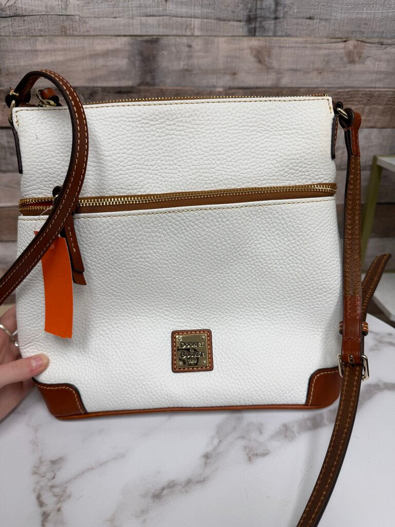 Dooney&Bourke white with with red lining crossbody bag