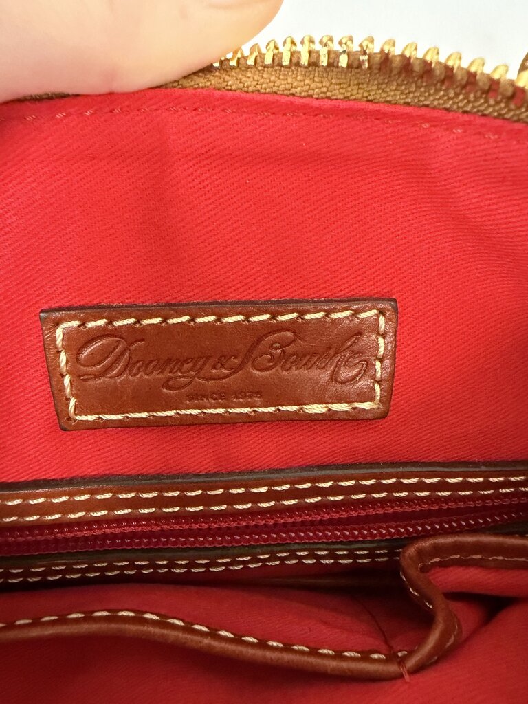 Dooney&Bourke white with with red lining crossbody bag