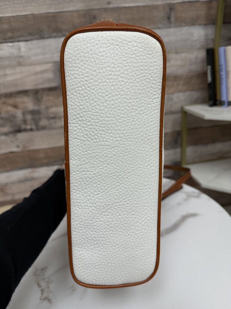 Dooney&Bourke white with with red lining crossbody bag