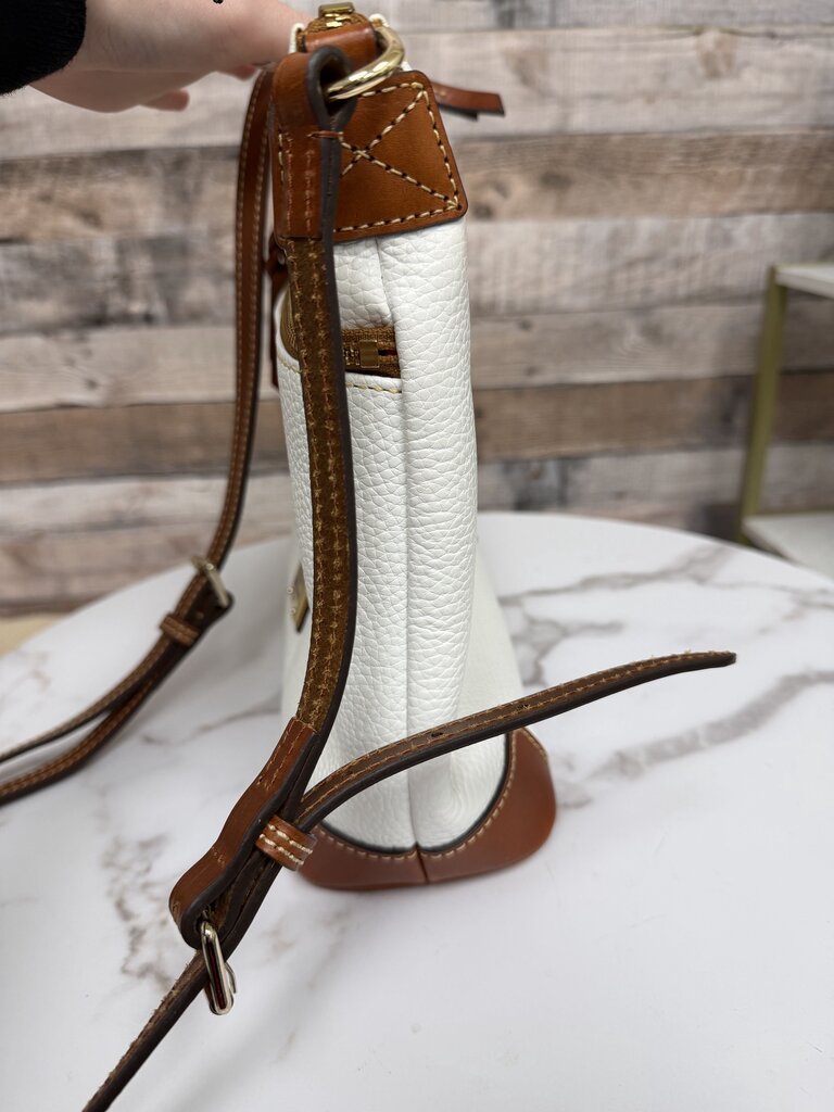 Dooney&Bourke white with with red lining crossbody bag