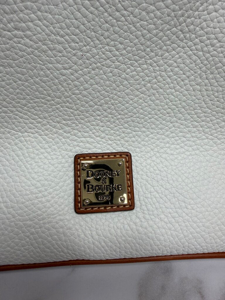 Dooney&Bourke white with with red lining crossbody bag