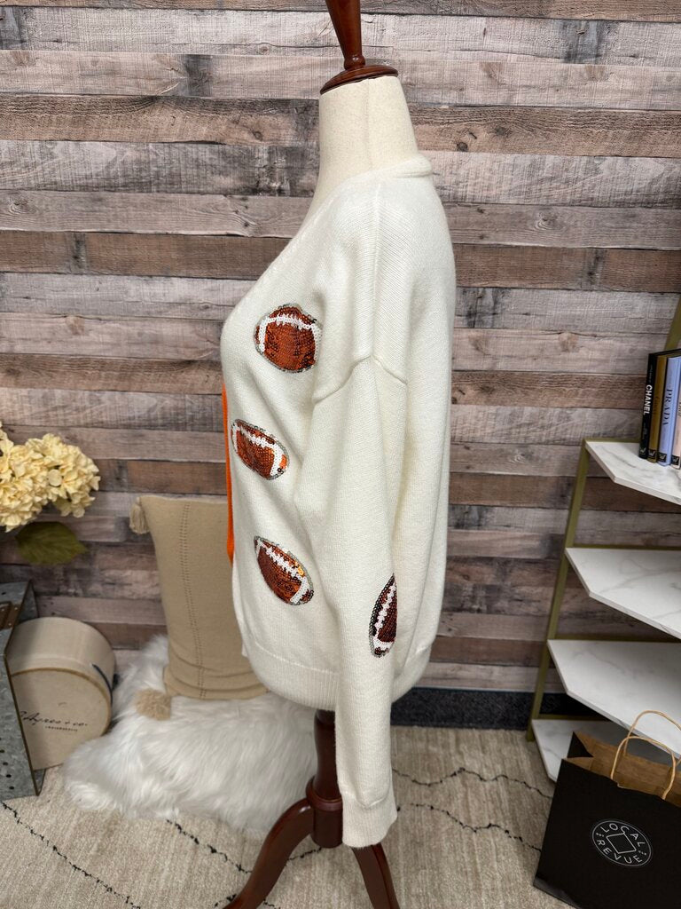 Le Lis Collection orange/white sparkly football cardigan